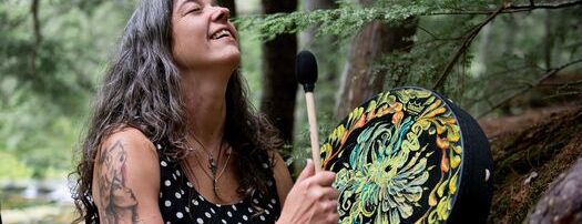 Candace Raynes drumming at Shifting Light Studio